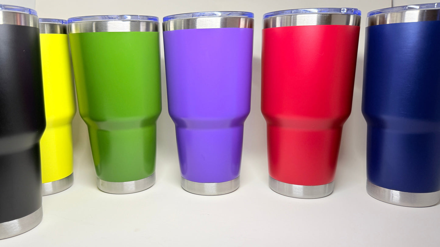 Set of colorful insulated tumblers on a white background